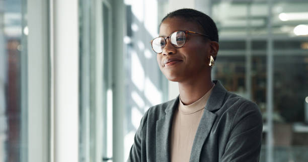 istock Office, thinking and happy black woman with ideas, choice or creative problem solving decision. Solution, smile and proud business advisor daydreaming of profit growth, inspiration or opportunity 2198137831