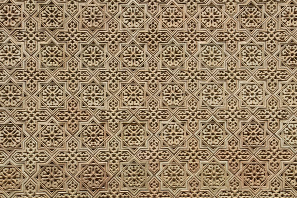 Intricate pattern and Arabic Calligraphy Art in Alhambra  Granada, Spain, July 2024