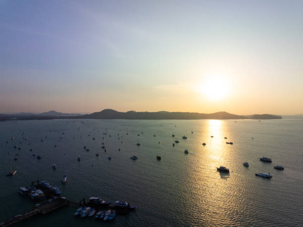 istock Aerial view sunset or sunrise sky over sea with mountains 2198147626