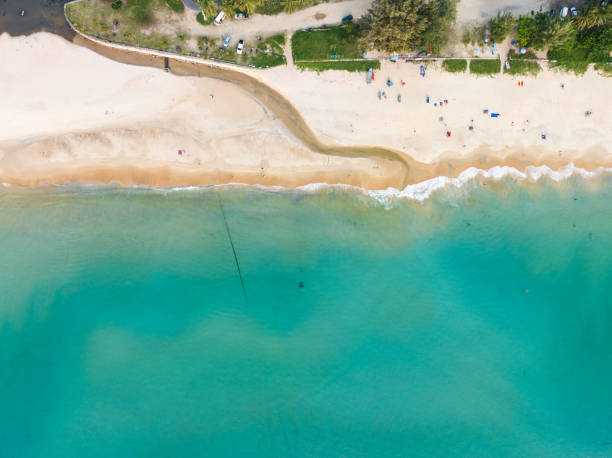 istock Aerial view Beach waves crashing on sandy shore 2198147677