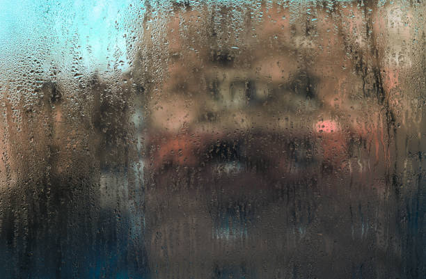 istock abstract wet glass background. view from the window 2198147902