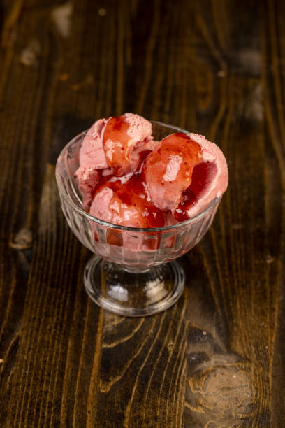 istock red strawberry-flavored ice cream in a glass bowl 2198148056