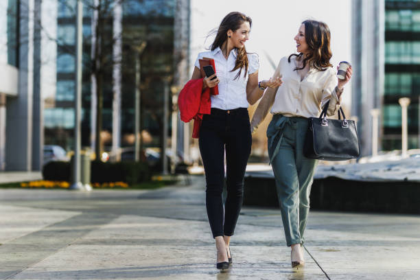 istock Two Business Woman Walking On Their Way To Work 2198150836
