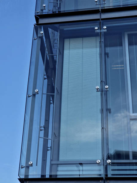 istock Glass facades do not need additional external shading, because glass with an anti-solar metalized layer is used regulate sunlight. hung on metal screws. they ventilate with cracks, overheating, heat 2198150930