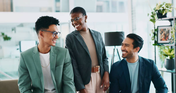 istock Office, break and business people laughing with discussion for startup, planning and ideas session. Smile, colleagues and funny joke with conversation for career story, work opinion and collaboration 2198155273