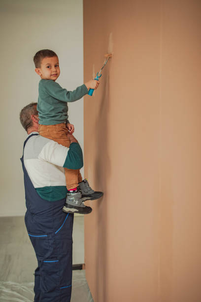 istock House painting, two men painting 2198156097