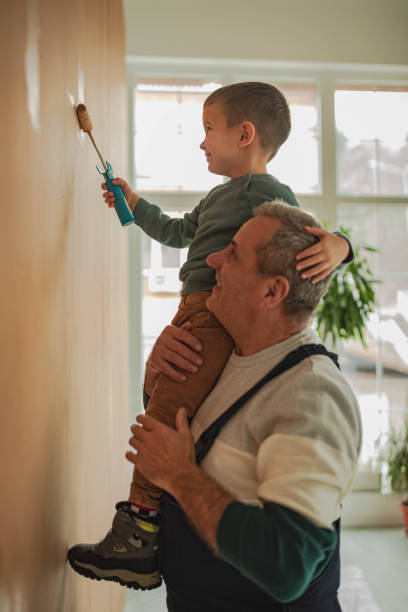 istock House painting, two men painting 2198156102