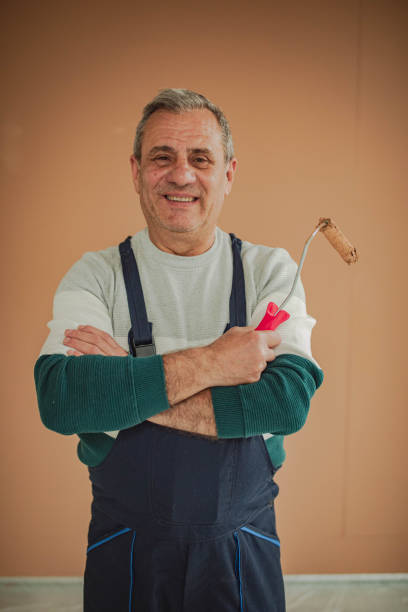 istock Portrait of a smiling painter 2198156120