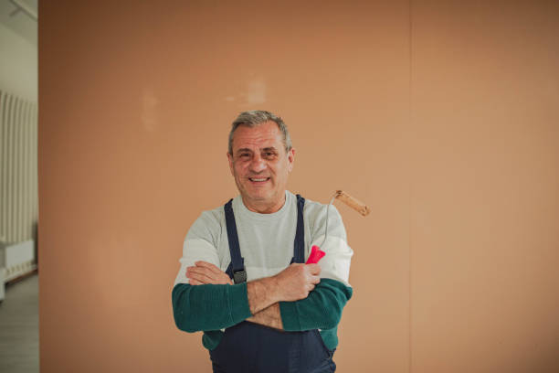 istock Portrait of a smiling painter 2198156160