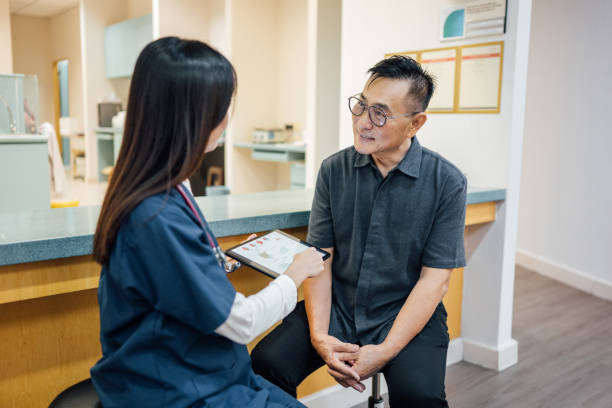 istock Revolutionizing Patient Care: Doctor and Patient Analyzing Health Data 2198158710