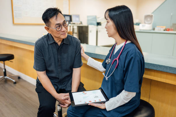 istock Empathy in Action: Doctor Supports Patient with Healthcare Data 2198159015