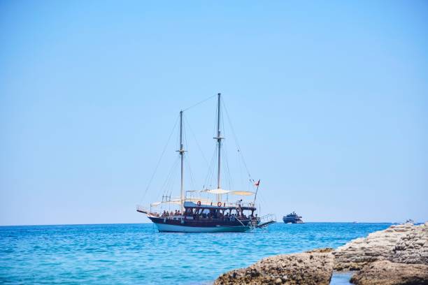 Kemer, Turkey.  - July 30, 2024: A ship with tourists in the Mediterranean Sea.