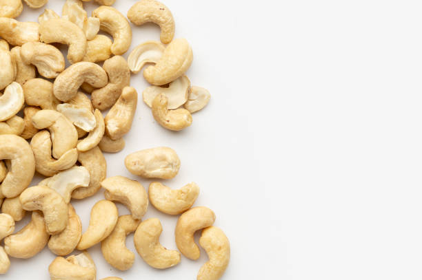 istock Pile of Cashew Nuts on White Background 2198160774