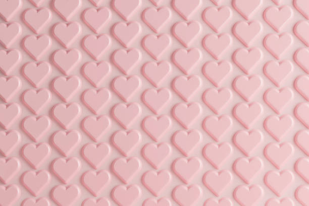A beautiful pink background featuring a repeating pattern of small hearts, ideal for Valentine's Day celebrations in February. This design brings a romantic and cheerful atmosphere.