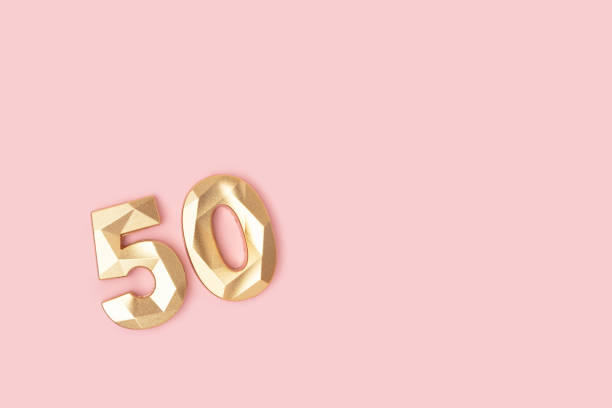 istock Golden number 50 on a pink background. 2198165304