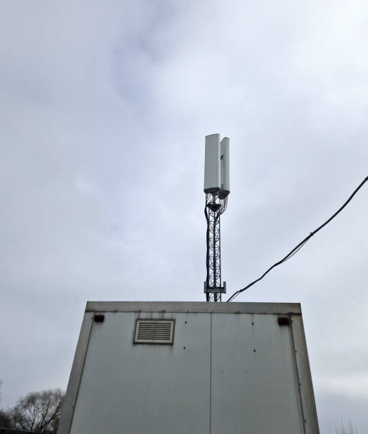 istock The top of a mobile phone communication tower with multiple antennas. A mobile container supplies a signal to an industrial area far outside the city. A container amplifier of mobile operators 2198173242