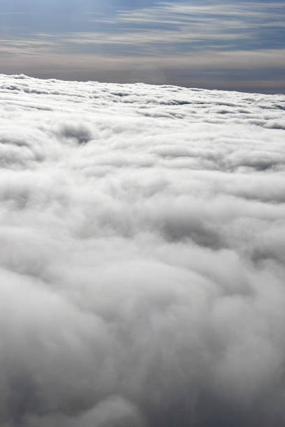 Cloud and blue sky from the airplane windows