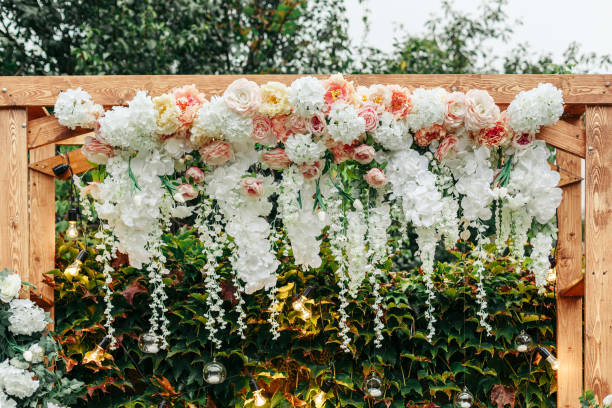 istock Elegant Outdoor Wedding Arch with Floral Decor 2198181766