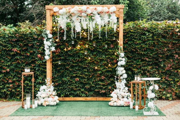 istock Elegant Outdoor Wedding Arch with Floral Decor 2198181772