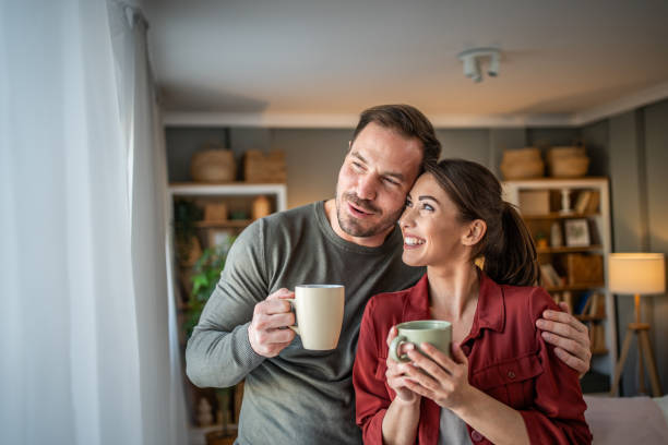 istock Happy couple sharing a coffee moment 2198183534