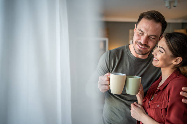 istock Happy couple sharing a coffee moment 2198183557