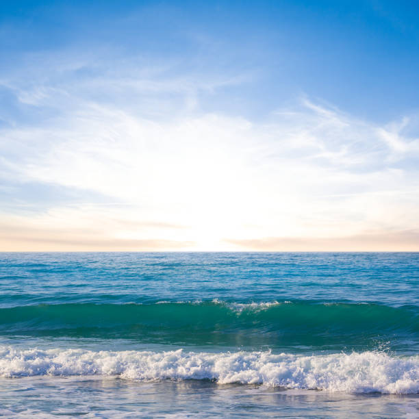 istock emerald sea coast with waves at the sunset 2198186497