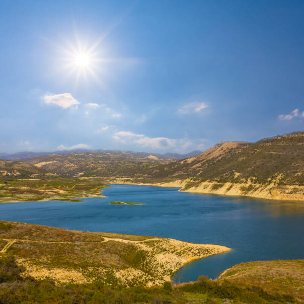big lake in mountain valley at the sunny day