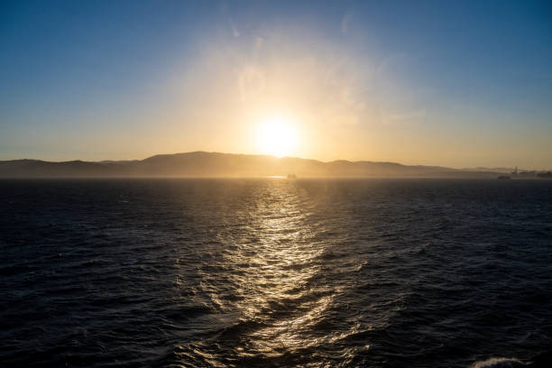 istock Golden Sunset with Reflections on the Sea 2198188090
