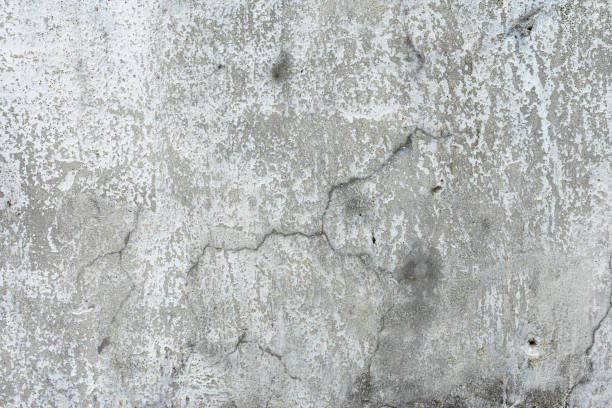 istock Grey retro cement crack with sand and stone good for decorative design element, vintage surface of architecture urban. 2198188202