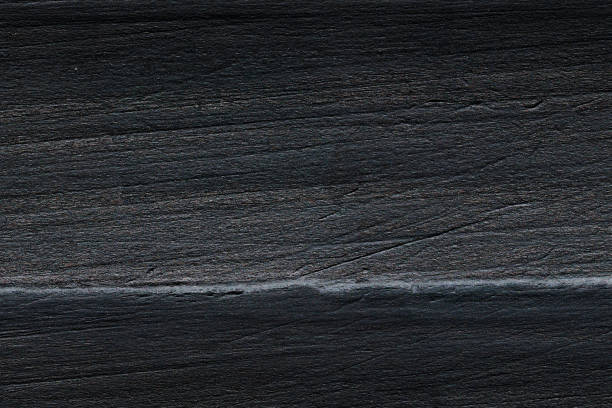 istock High angle view of a flat textured wooden board backgrounds. 2198189610