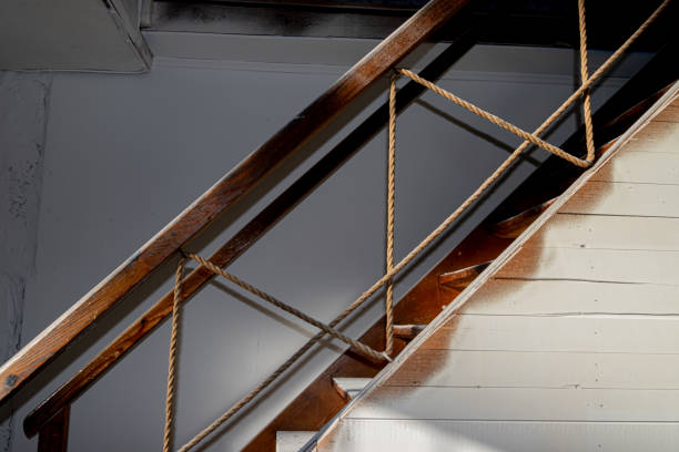 istock A Rustic Wooden Staircase with Rope Handrails 2198192418