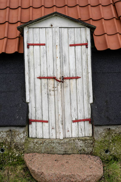 Detail of an old wooden window shutter