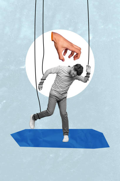 istock Vertical photo collage image young man manipulated authority strings doll puppet mass media control brainwashed zombie human arm 2198193843
