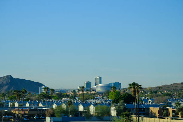 Scottsdale, AZ, USA - 20 JAN 2025 - A view over Scottsdale, Phoenix, Arizona showing the downtown urban sprawl and distant mountains.