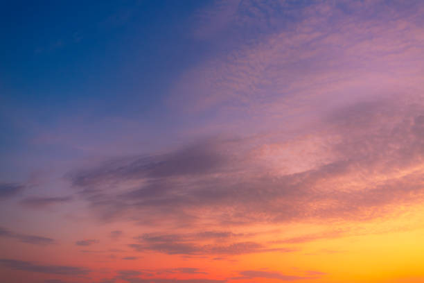 istock Evening clouds and sky background,Beautiful , luxury soft gradient orange gold clouds and sunlight on the blue sky perfect for the background, take in everning,Twilight, Large size, high definition landscape photo 2198197190