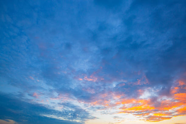 istock Evening clouds and sky background,Beautiful , luxury soft gradient orange gold clouds and sunlight on the blue sky perfect for the background, take in everning,Twilight, Large size, high definition landscape photo 2198197252