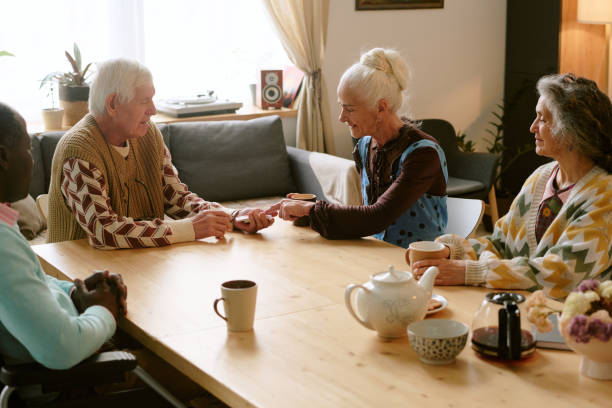 istock Pensioners Playing Cards 2198197924