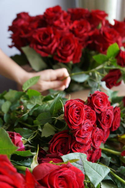 istock florist collects bouquet 2198198012