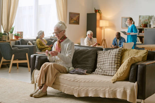 istock Senior Woman Using Knitting Set to Crochet 2198198387