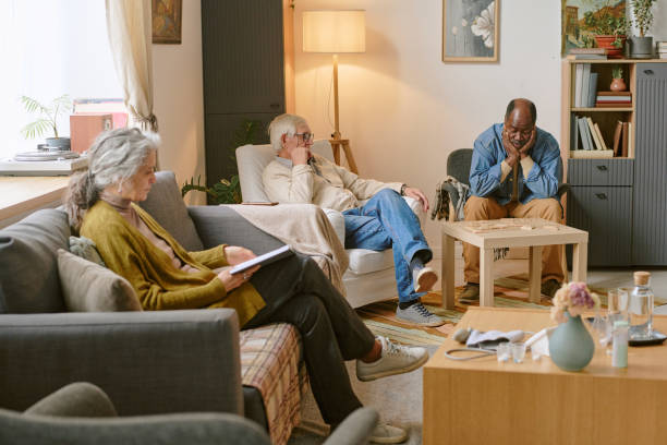 istock Senior People Spending Time in Living Room 2198198411