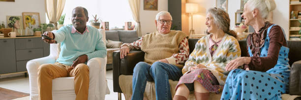 istock Header with Senior People Communication in Living Room 2198199670