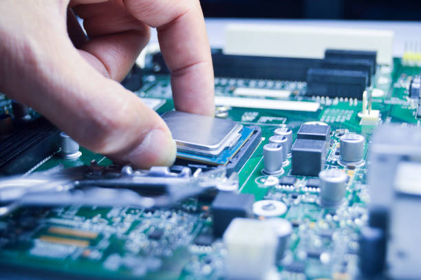 istock The technician is installing the CPU onto the motherboard. 2198200725