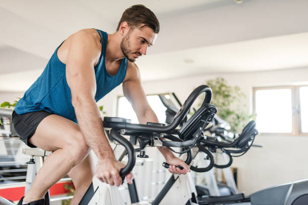 istock man on the cyclette at the gym 2198202197
