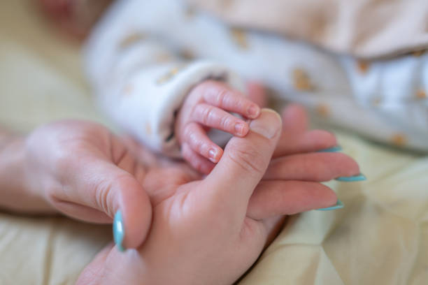 istock A new born baby portrait 2198203168