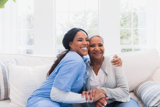 istock Emotional Support: Nurse and Patient Embrace in Warm Home 2198206051