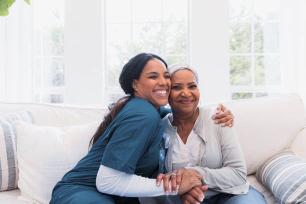 istock Emotional Support: Nurse and Patient Bonding on a Sofa 2198206057