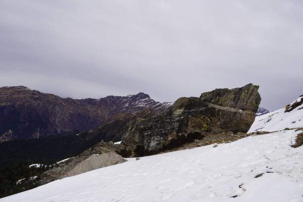 istock snow covered side view of tugnnath temple 2198207466