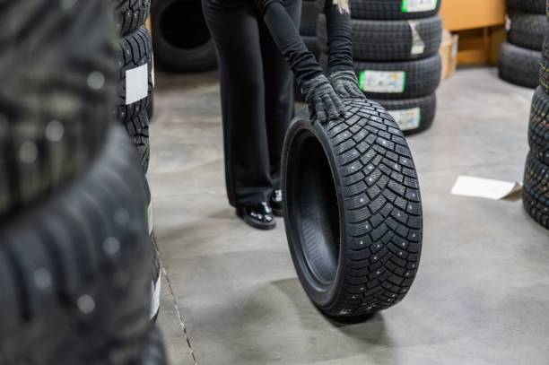 istock Mechanic keeps new studded car tires in garage. 2198208461