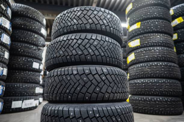 istock New car studded tires in the store. 2198209315