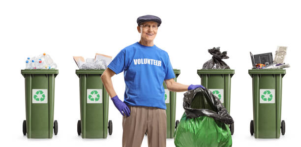 istock Elderly volunteer collecting recycling waste in a plastic bag 2198213057